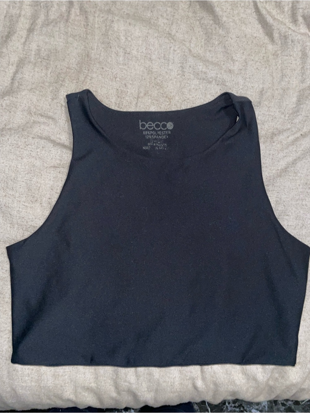 Black workout top with open back detail